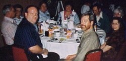 Jeff, Jim, Gail, and others at the 1996 dinner.
